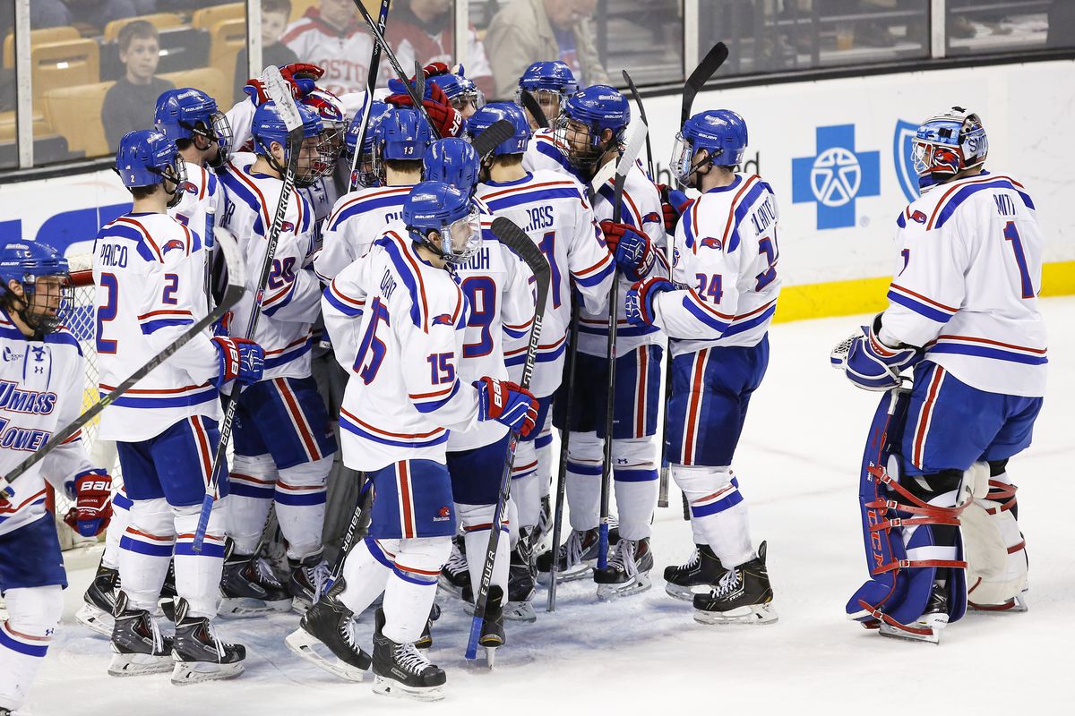 UMass Lowell players celebrate their win over Vermont in the 2015 Hockey East Semifinals.