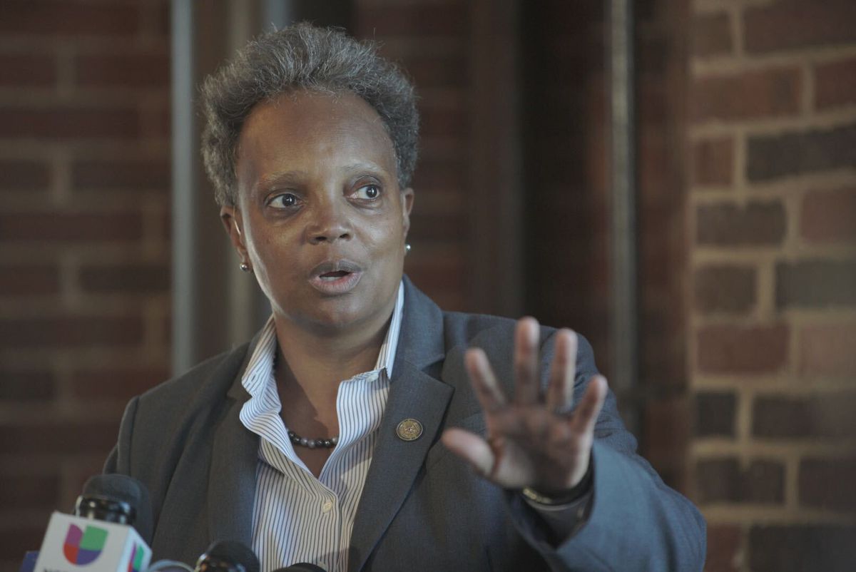Mayor Lori Lightfoot talks to reporters Wednesday, Sept. 29, 2021 after a Chicago Fire Department graduation ceremony.