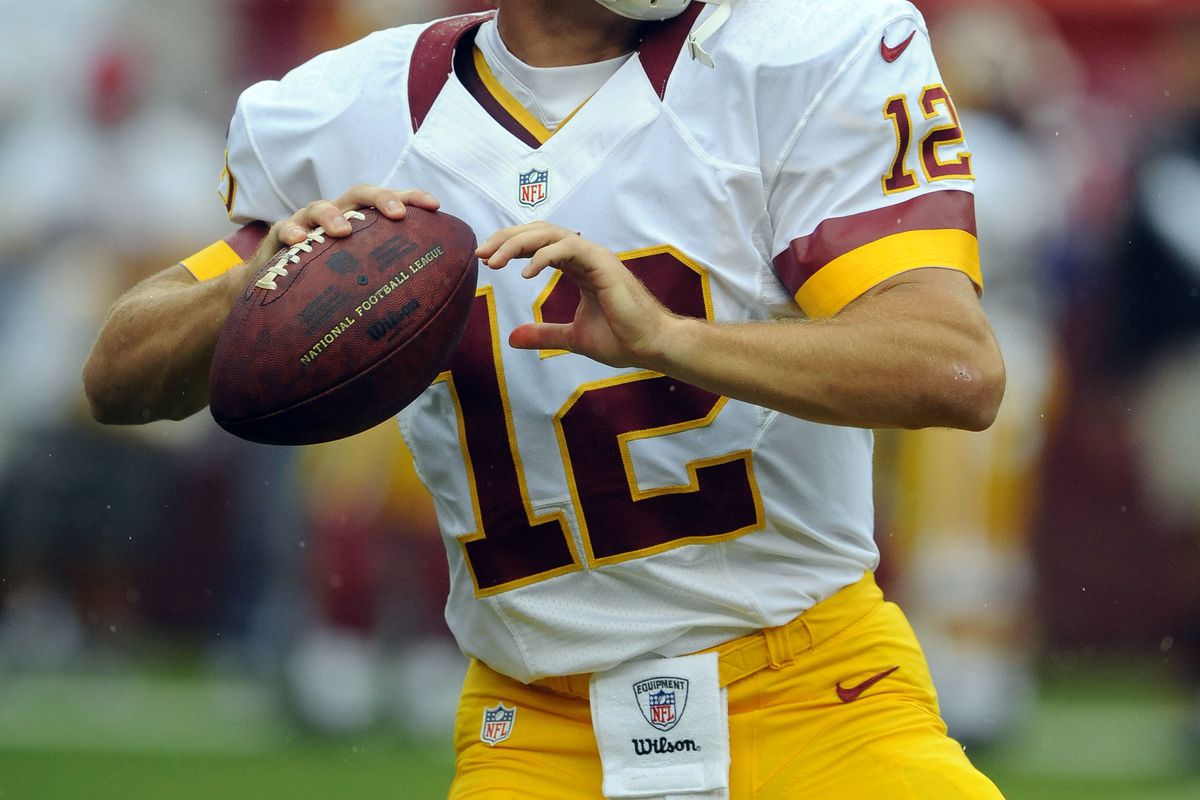 Aug 25, 2012; Landover, MD, USA; Washington Redskins quarterback Kirk Cousins (12) warms up before the game against the Indianapolis Colts at FedEX Field. Mandatory Credit: Brad Mills-US PRESSWIRE