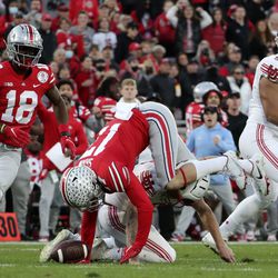 Ohio State Buckeyes safety Bryson Shaw (17) retrieves the ball after Utah Utes punter Michael Williams (61) fumbles the ball in the 108th Rose Bowl game in Pasadena, Calif., on Saturday, Jan. 1, 2022.