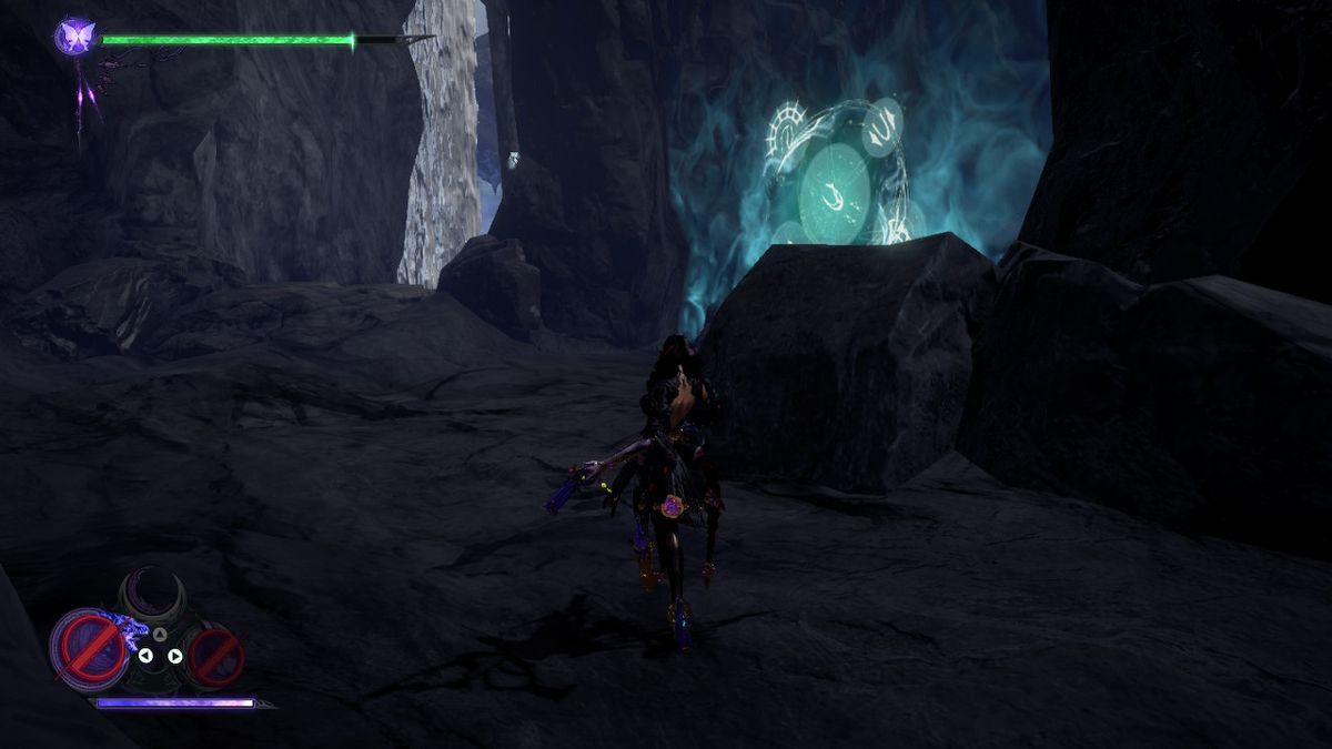 Bayonetta stands in a dark cave next to the Broken Pearl in Bayonetta 3.