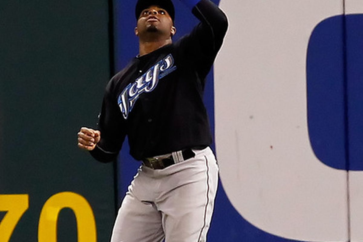 ST PETERSBURG, FL - MAY 03:  Outfielder Rajai Davis #11 of the Toronto Blue Jays catches a fly ball against the Tampa Bay Rays during the game at Tropicana Field on May 3, 2011 in St. Petersburg, Florida.  (Photo by J. Meric/Getty Images)