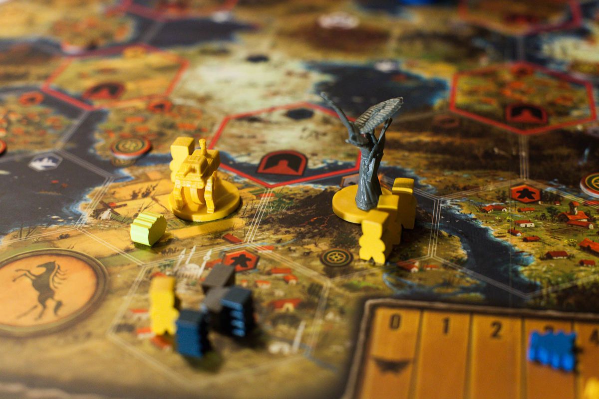 In Scythe, players are trying to build an empire composed of farmers and giant mechs.
