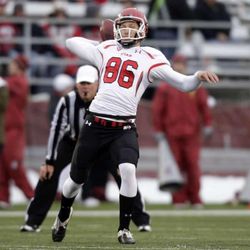 Utah punter Sean Sellwood (86) passes to wide receiver Luke Matthews (11) for a 49-yard touchdown on a fake punt against Washington State during the first half of an NCAA College football game Saturday, Nov. 19, 2011, in Pullman Wash. (AP Photo/Dean Hare) Sellwood signed an NFL free agent deal with the Atlanta Falcons.