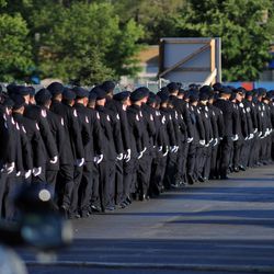 Firefighters line up for visitation services for Firefighter Juan Bucio at St. Rita of Cascia Shrine Chapel. | Victor Hilitski/For the Sun-Times