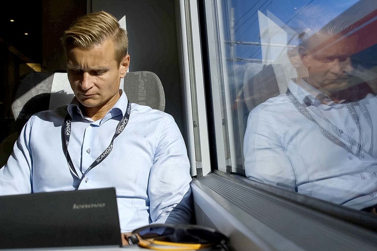 Martin Carlberg rides a train from Oslo, Norway, to nearby Drammen on his way home from work on Monday, August 13, 2018.