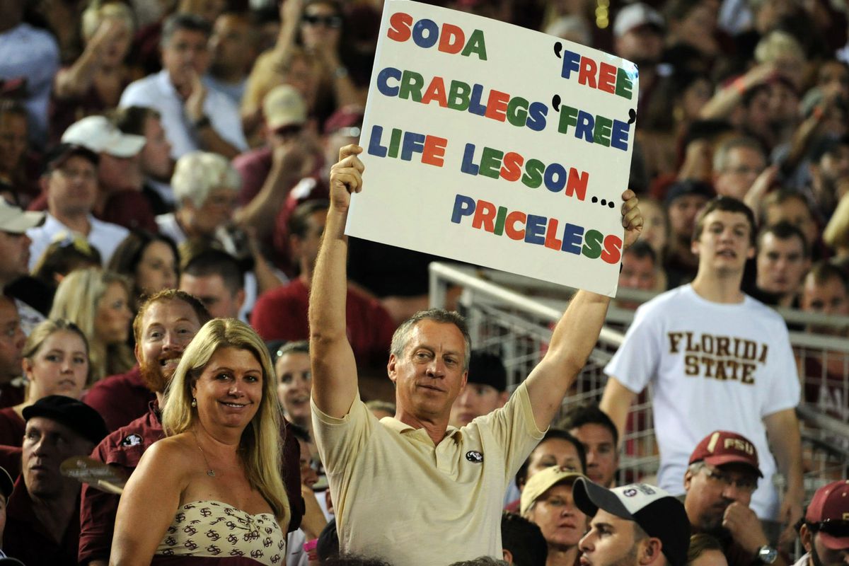 Florida State Seminoles fans hold a sign referring to quarterback Jameis Winston (5) (not pictured) during the game against the Clemson Tigers at Doak Campbell Stadium. 