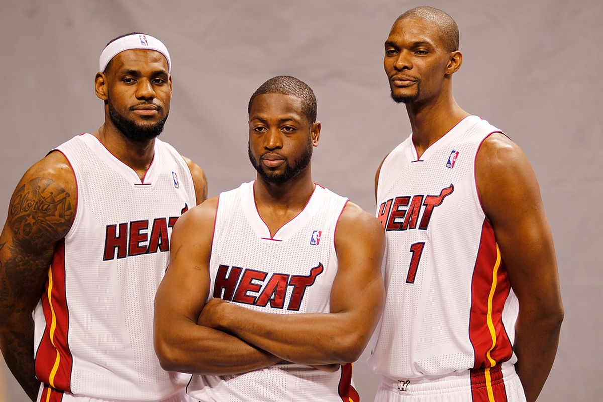 MIAMI, FL - DECEMBER 12:  LeBron James #6, Dwyane Wade #3, and Chris Bosh #1 of the Miami Heat poses during media day at American Airlines Arena on December 12, 2011 in Miami, Florida.  (Photo by Mike Ehrmann/Getty Images)