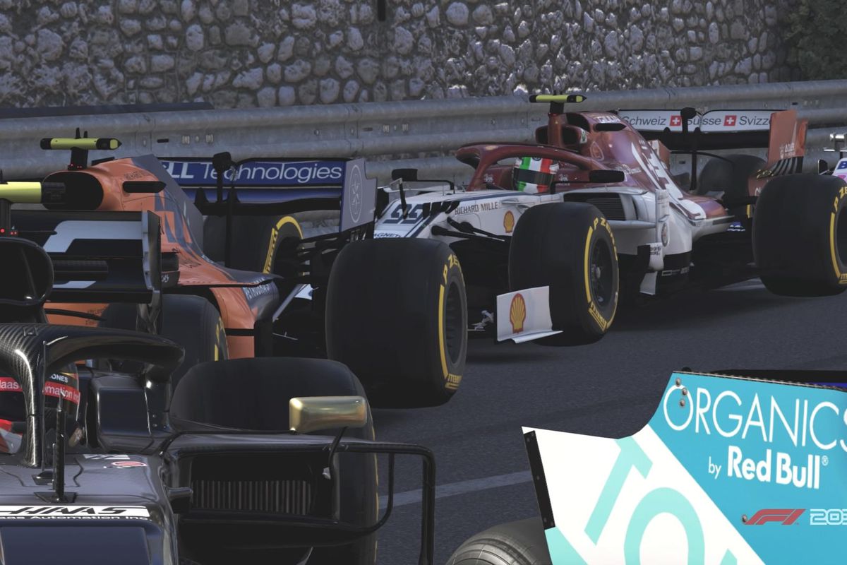 The field queued up through the infamous Loews Hotel hairpin turn at Monaco in F1 2019.
