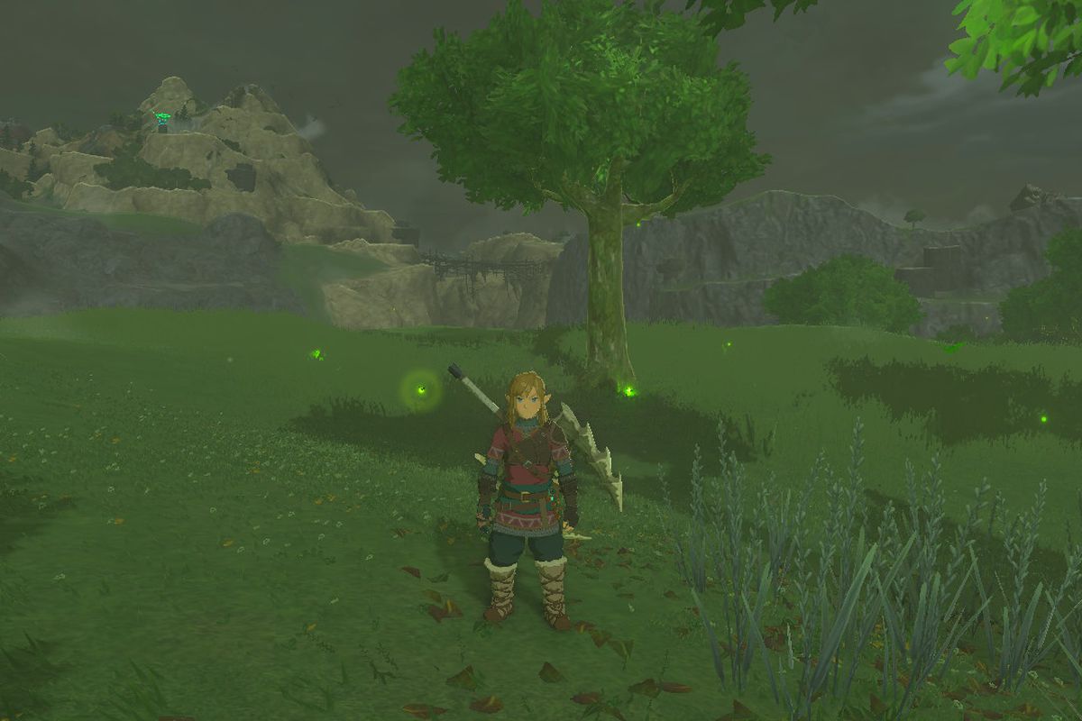 Link stands amid a swarm of Sunset Fireflies in The Legend of Zelda: Tears of the Kingdom
