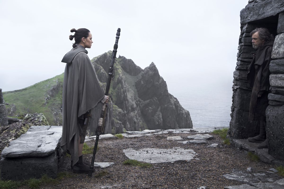 Daisy Ridley as Rey and Mark Hamill as Luke Skywalker in Star Wars: The Last Jedi