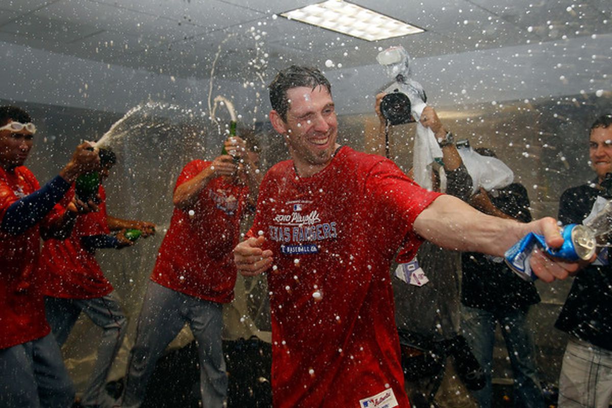 Pitcher Cliff Lee #33 of the <strike>Texas Rangers </strike> Philadelphia Phillies celebrates Lone Star Ball getting its 10 millionth visit.  (Photo by J. Meric/Getty Images)