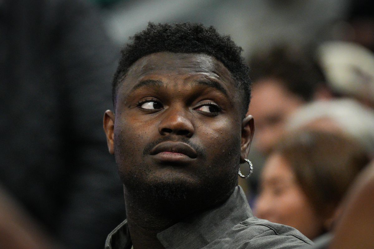 Zion Williamson of the New Orleans Pelicans, out due to injury, watches from the bench during a game against the Golden State Warriors at Chase Center on March 28, 2023 in San Francisco, California.
