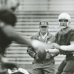 BYU head football coach LaVell Edwards watches Tom Young throw on March 24, 1991.