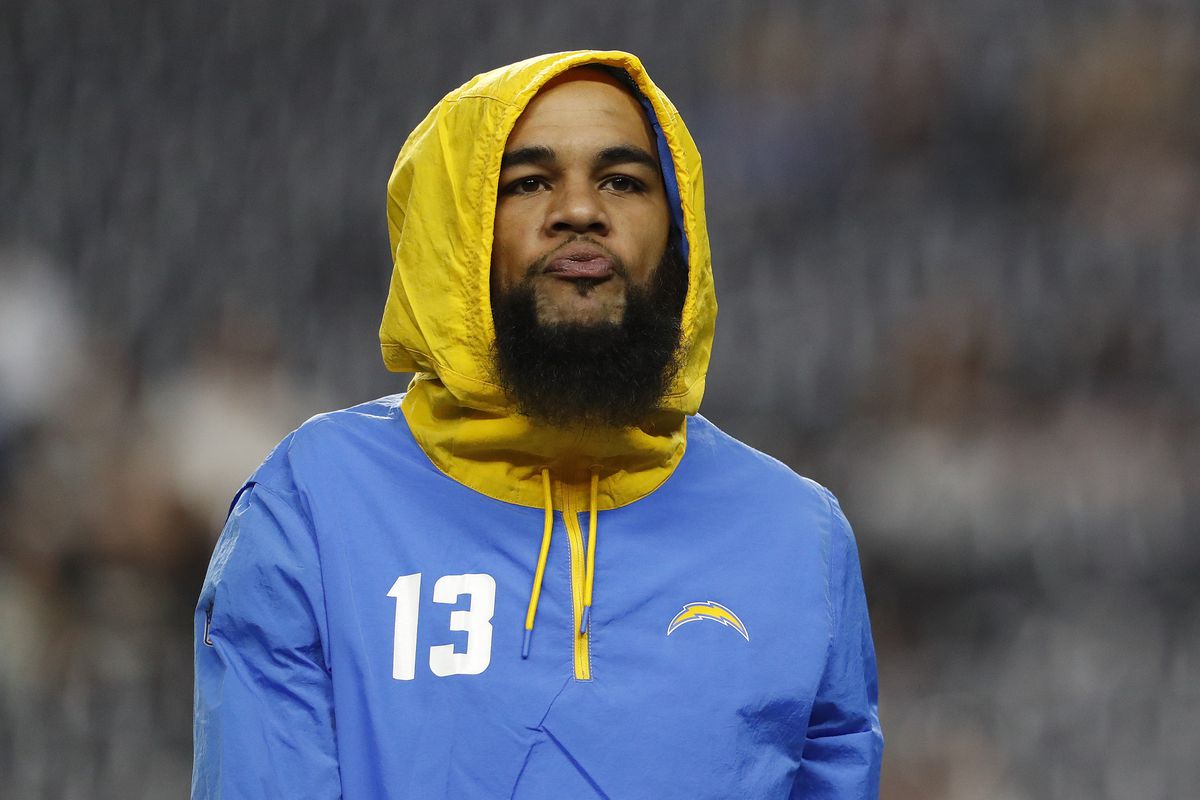Keenan Allen #13 of the Los Angeles Chargers warms up before playing against the Las Vegas Raiders at Allegiant Stadium on January 09, 2022 in Las Vegas, Nevada.