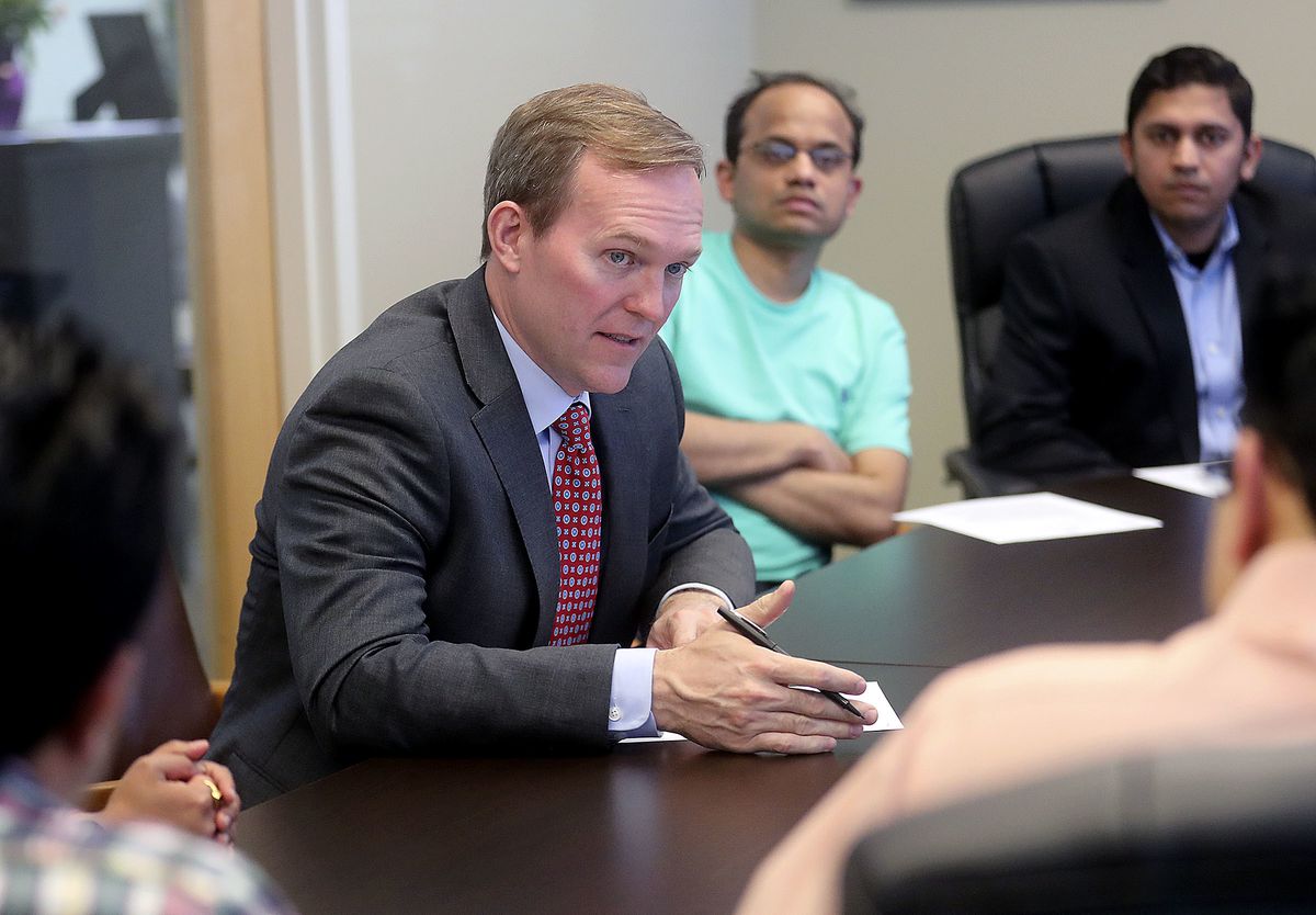 Rep. Ben McAdams, D-Utah, discusses protecting H-4 visa holders with immigrants from India during a meeting at his office in West Jordan on Tuesday, April 23, 2019. President Donald Trump has a proposed eliminating 90,000 H-4 visas, which are typically is