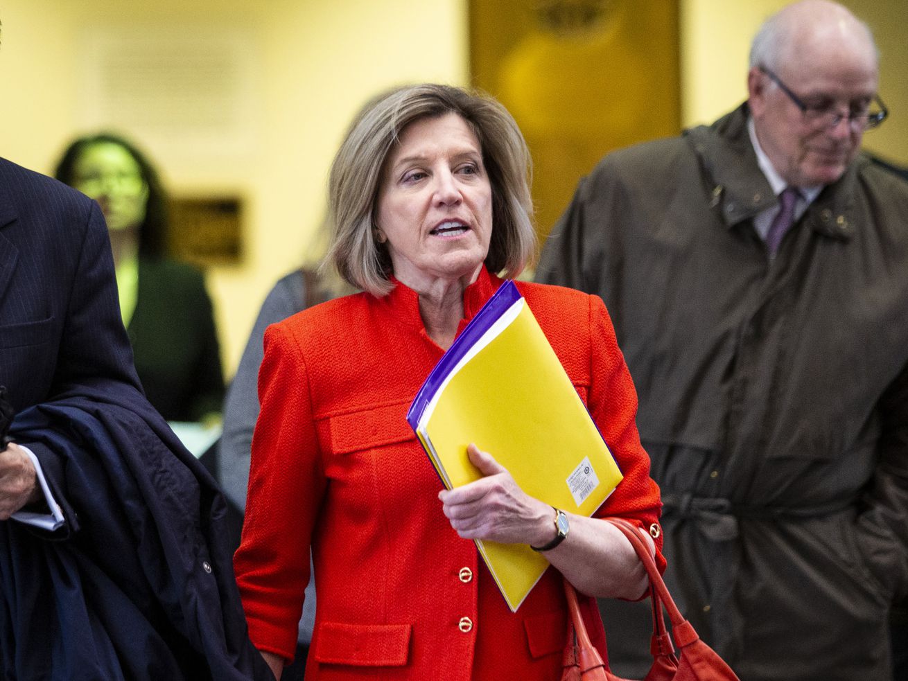Former State Appeals Court Judge Sheila O’Brien walks out of the Leighton Criminal Courthouse in Chicago.