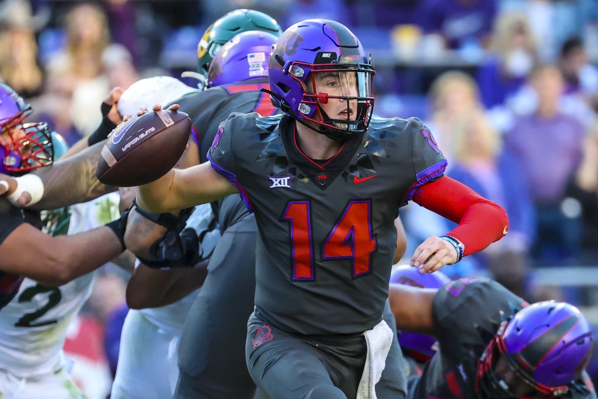 TCU Horned Frogs quarterback Chandler Morris (14) throws during the second half against the Baylor Bears at Amon G. Carter Stadium.