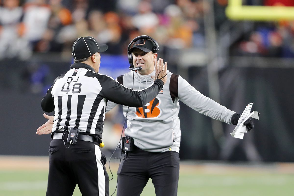 Cincinnati Bengals head coach Zac Taylor talks with the official during the fourth quarter against the San Francisco 49ers at Paul Brown Stadium.