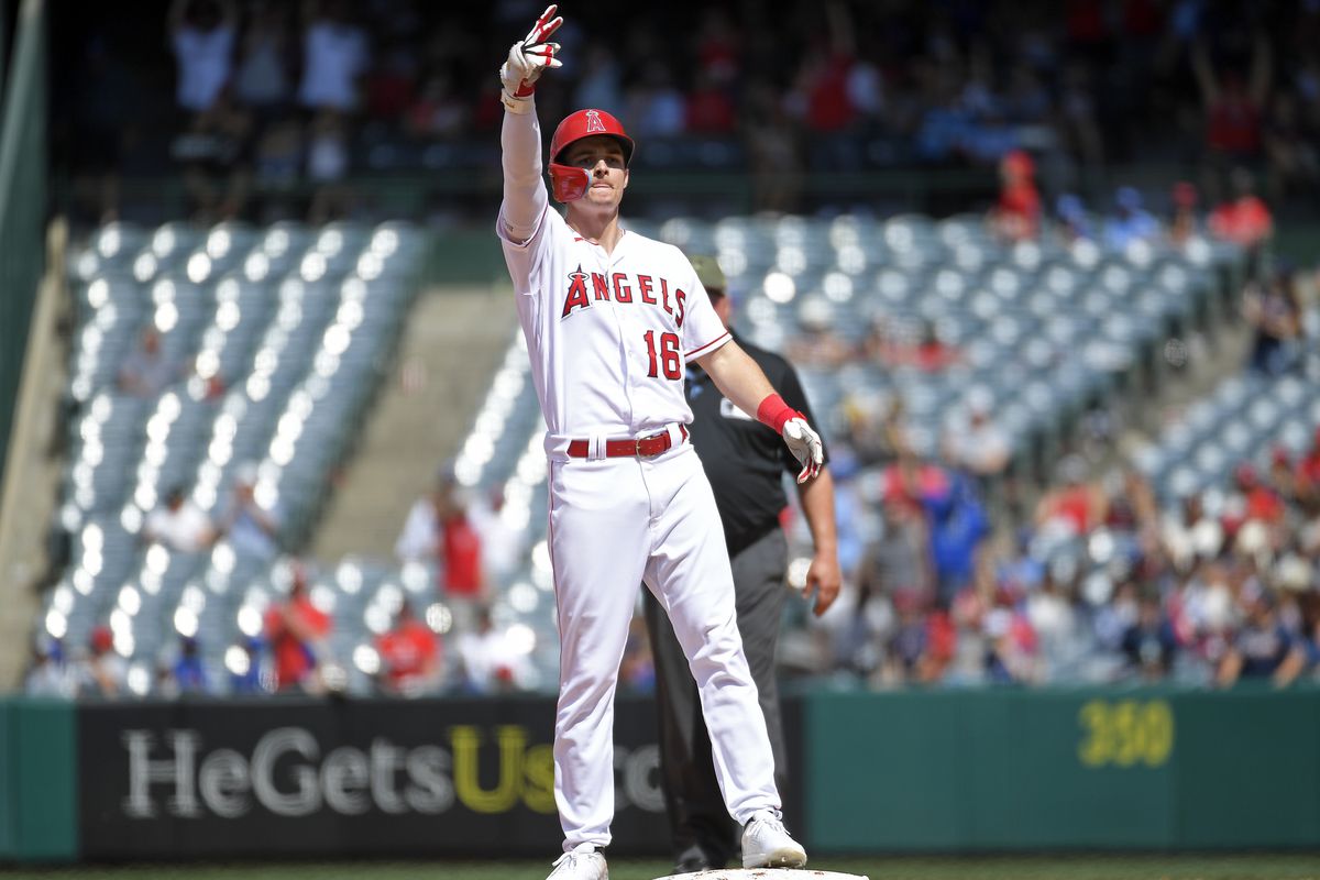 Mickey Moniak of the Los Angeles Angels celebrate after hitting a two-run double to score teammates Zach Neto #9 and Matt Thaiss during the seventh inning against the Minnesota Twins at Angel Stadium of Anaheim on May 21, 2023 in Anaheim, California.
