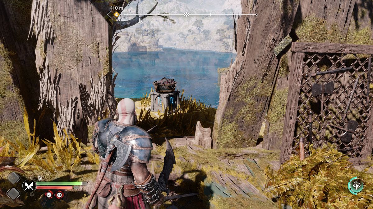 Kratos lights a brazier in God of War Ragnarök