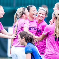 UConn women's soccer celebrates a goal.