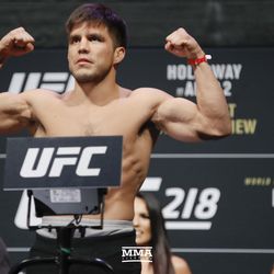 Henry Cejudo poses at UFC 218 weigh-ins.