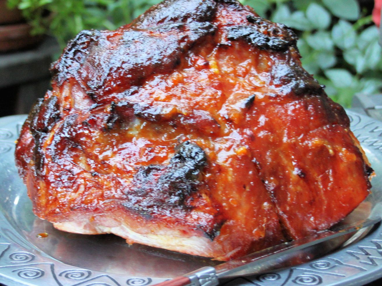 For best results when roasting or grilling a ham, purchase a good-quality ham with the bone or partial bone in, which adds more flavor to the ham while cooking. Avoid a spiral ham, because it will easily dry out.
