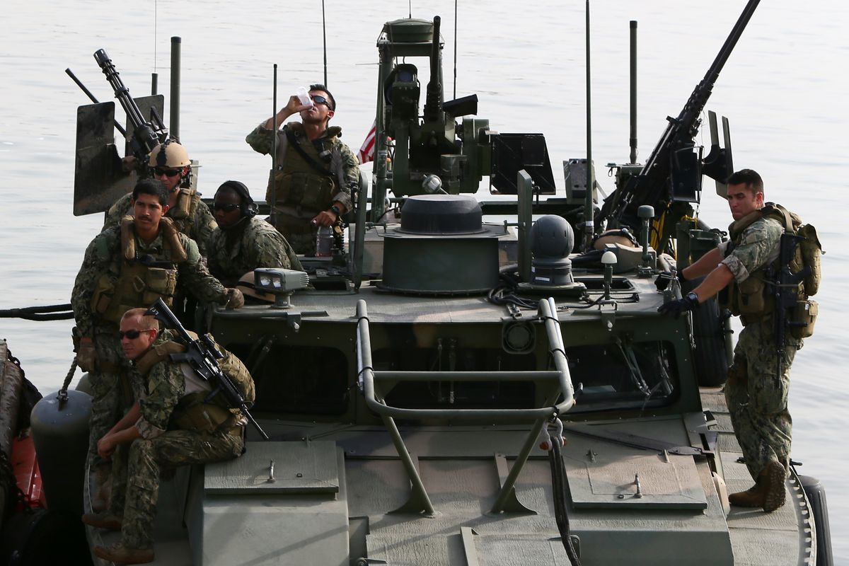 US sailors on a riverine command boat in Bahrain, the type of ship that Iran detained and then released.