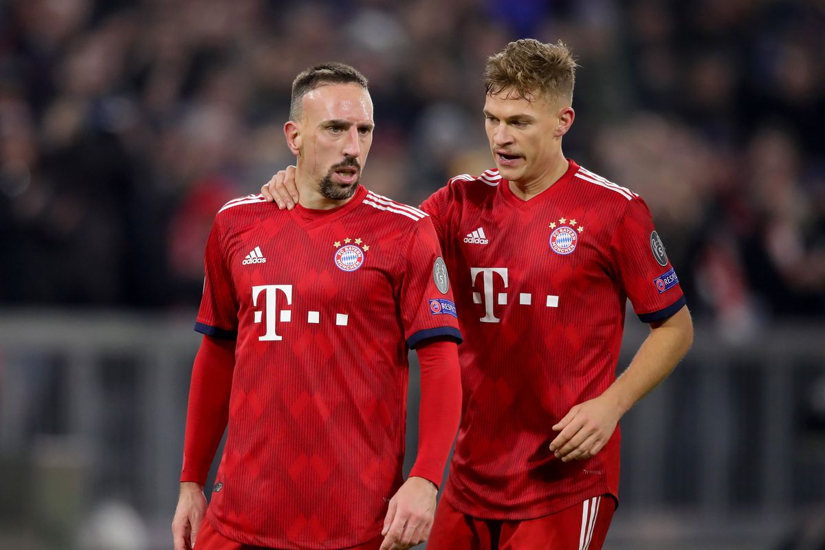 FC Bayern Muenchen v SL Benfica - UEFA Champions League Group E
MUNICH, GERMANY - NOVEMBER 27: Franck Ribery of FC Bayern Muenchen celebrates scoring the 5th goal with his team mate Joshua Kimmich during the Group E match of the UEFA Champions League between FC Bayern Muenchen and SL Benfica at Allianz Arena on November 27, 2018 in Munich, Germany.