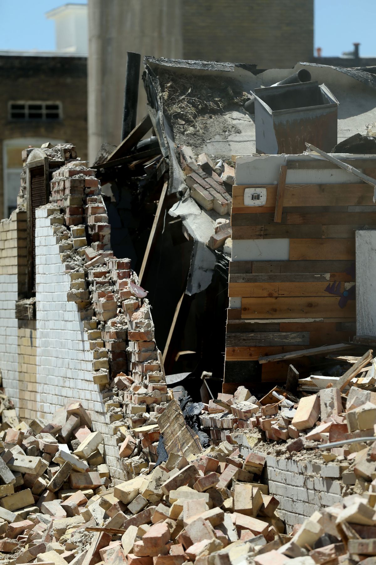 An unreinforced masonry building located on First Avenue in Salt Lake City is demolished on Wednesday, July 3, 2019. The building recently collapsed as a result of rain pressure on the roof.