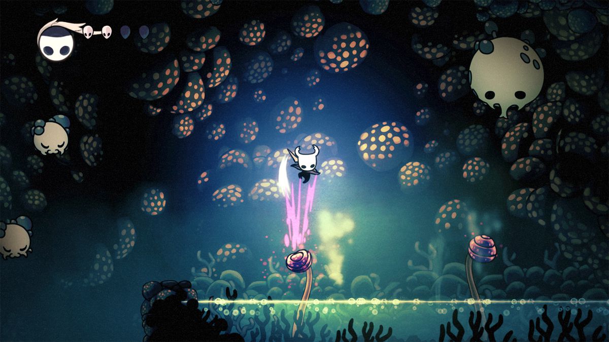 The Hollow Knight slashes down at a mushroom trampoline 