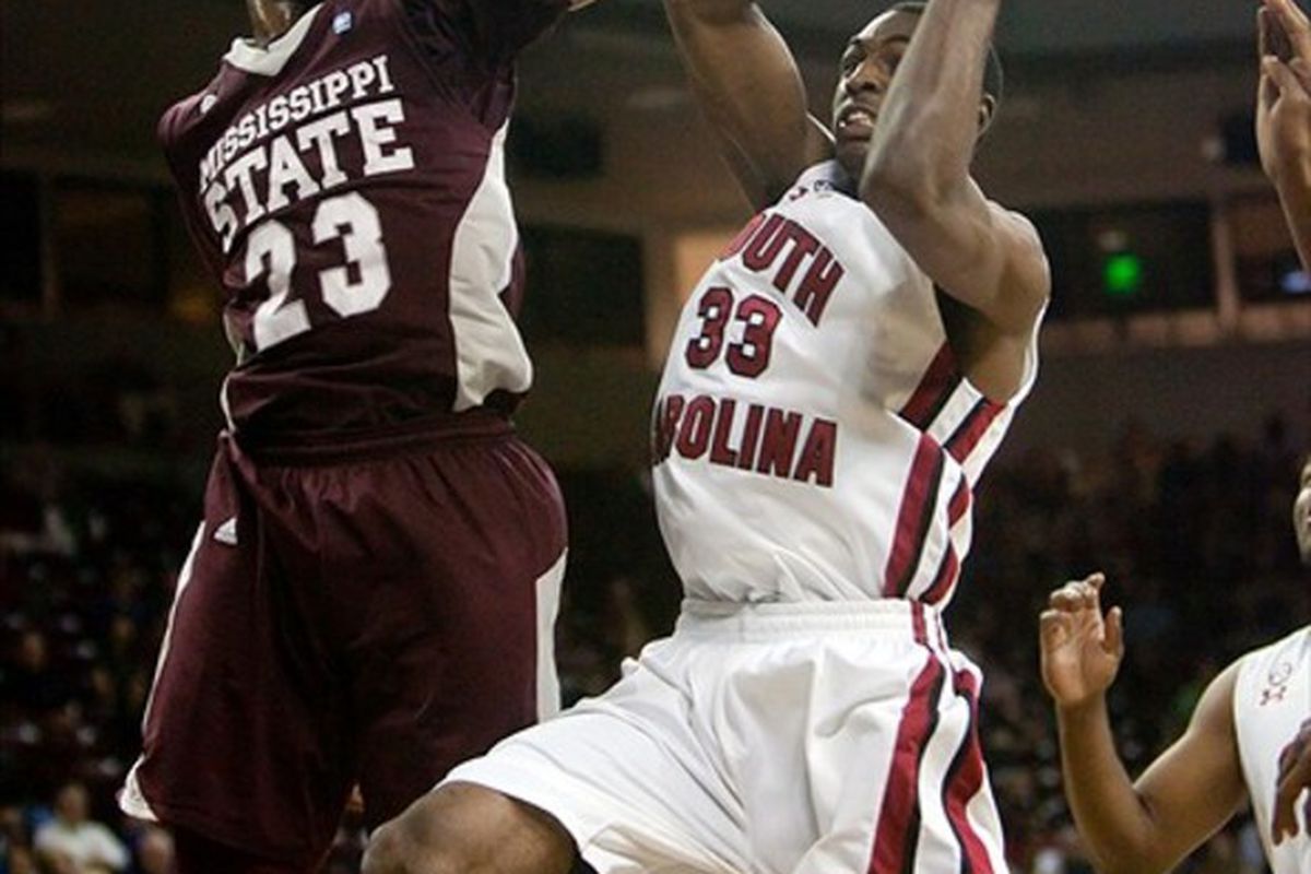 February 29, 2012; Columbia, SC,  USA; Mississippi State Bulldogs forward Arnett Moultrie (23) blocks the shot of South Carolina Gamecocks forward R.J. Slawson (33) in the first half at Colonial-Life Arena. Mandatory Credit: Jeff Blake-US PRESSWIRE