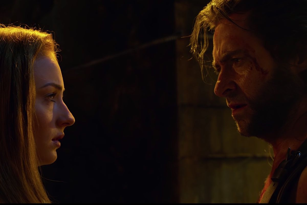 Jean Grey (Sophie Turner) and Wolverine (Hugh Jackman) appear in a scene from "X-Men: Apocalypse."