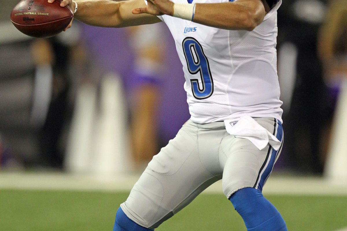August 17, 2012; Baltimore, MD, USA; Detroit Lions quarterback Matthew Stafford (9) drops back to pass during the preseason game against the Baltimore Ravens at M&T Bank Stadium. Mandatory Credit: Mitch Stringer-US PRESSWIRE