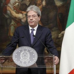 Italian Premier Paolo Gentiloni gives a press conference on the killing in Italy of suspected attacker at the Berlin Christmas market, during a press conference at Chigi Palace in Rome, Italy, Friday, Dec. 23, 2016. Gentiloni said Friday that he had called German Chancellor Angela Merkel to inform her that the man suspected of Monday's terrorist attack in Berlin had been killed near Milan.