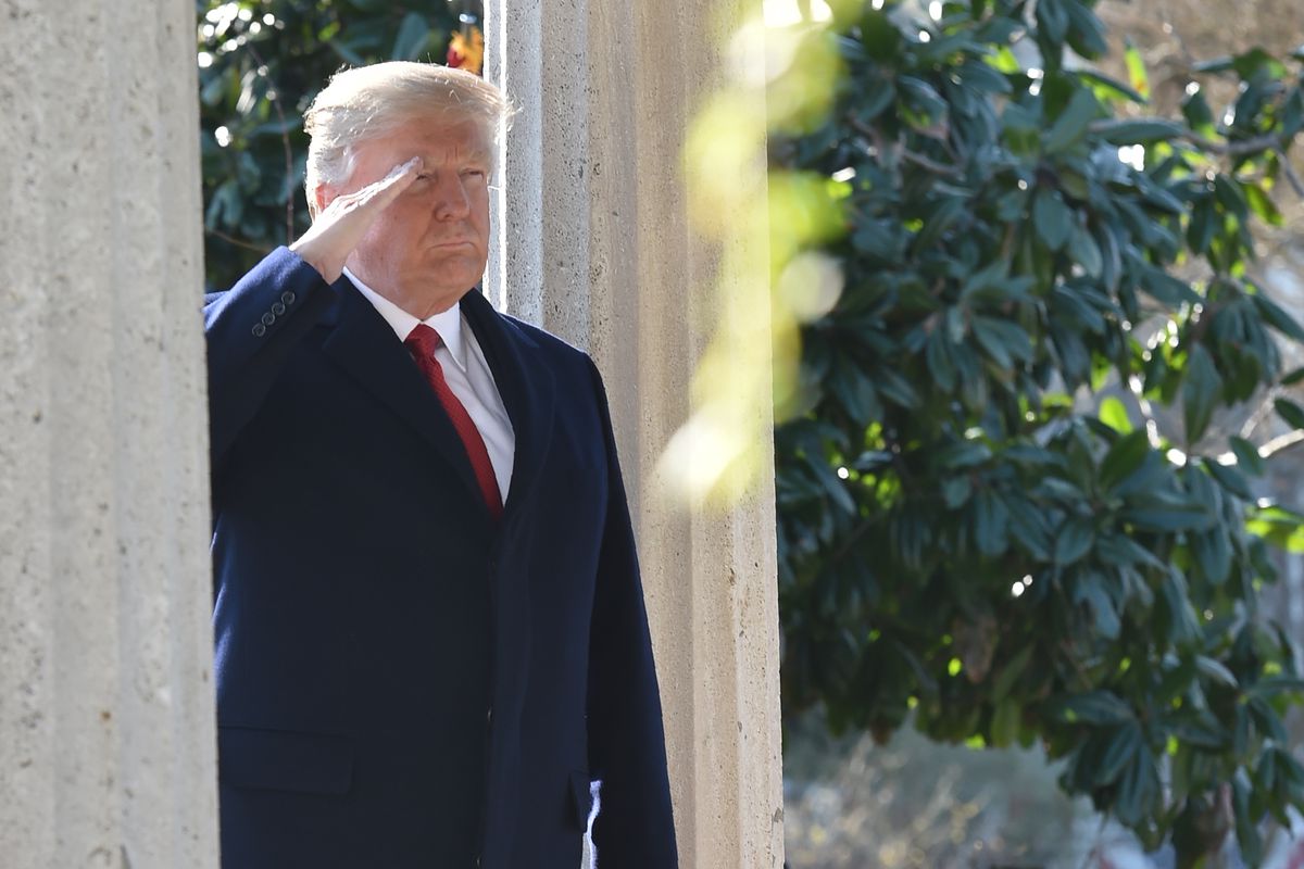 President Donald Trump salutes after laying a wreath at the tomb of former president Andrew Jackson, in March. A strong leader like Jackson could have prevented the Civil War, Trump has said.
