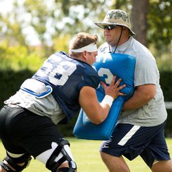 Former BYU and NFL offensive lineman Dallas Reynolds is back in Provo this fall, helping out as a graduate assistant on Kalani Sitake's staff.