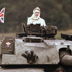 FILE - In this Sept. 17, 1986 file photo, British Prime Minister Margaret Thatcher stands in a British tank during a visit to British forces in Fallingbostel, some 120km (70 miles) south of Hamburg, Germany. Thatcher's former spokesman, Tim Bell, said the former prime minister, known to both friends and foes as "The Iron Lady," died of a stroke Monday morning, April 8, 2013. She was 87. 
