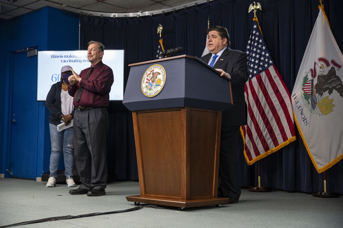 Gov. J.B. Pritzker speaks during hid COVID-19 update at the James R. Thompson Center in the Loop on Thursday.