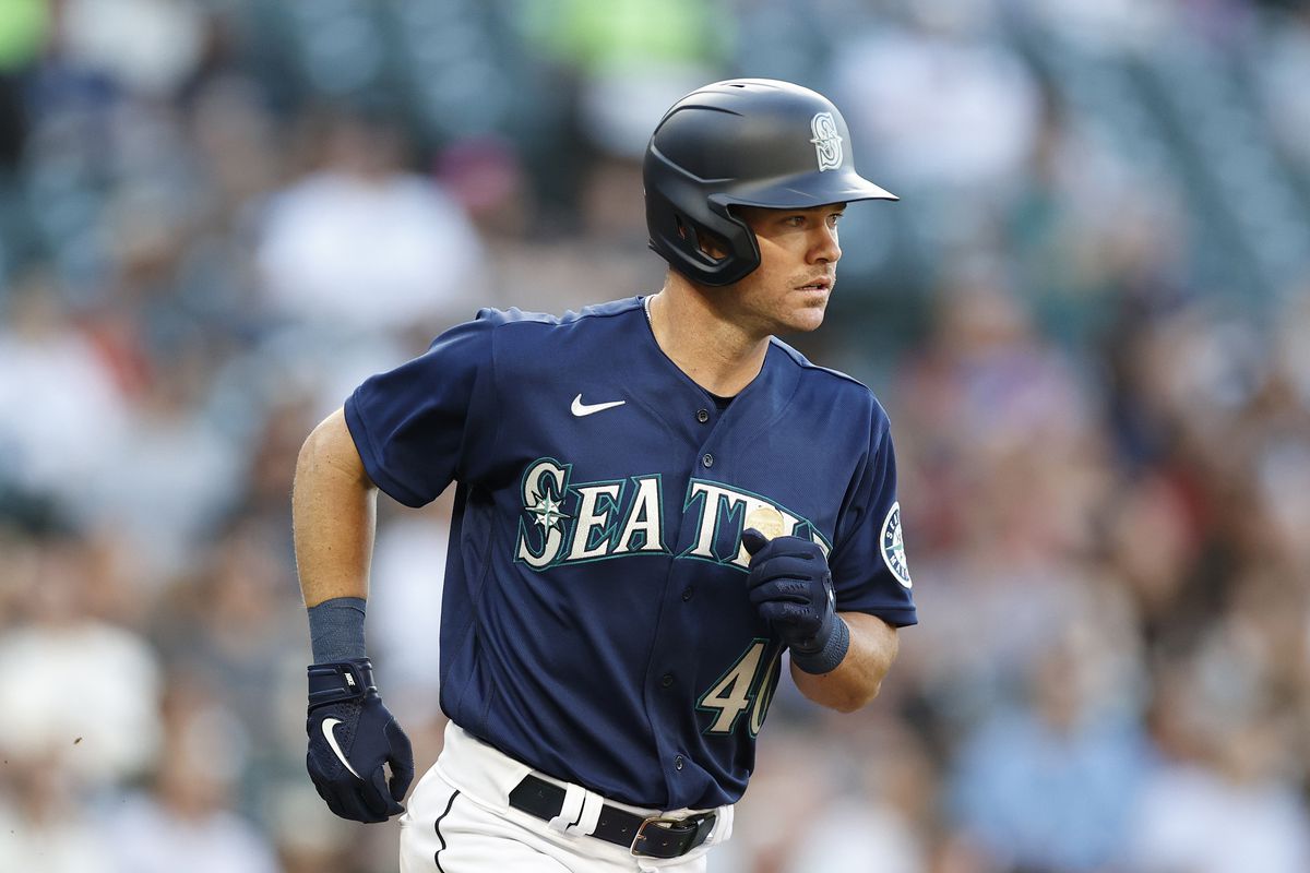 Andrew Knapp while wearing a Mariners jersey