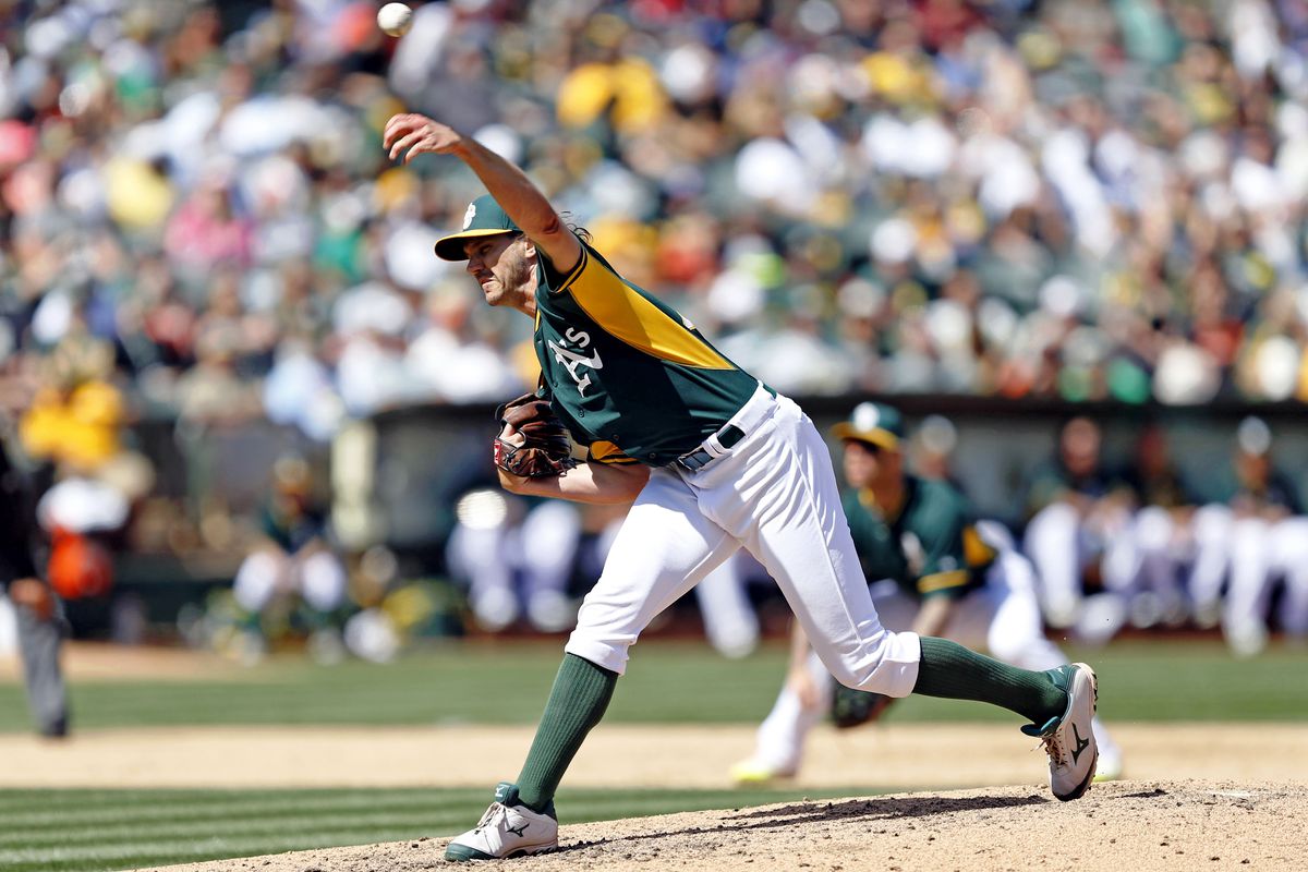 Barry Zito on the mound at the Coliseum in an A's uniform.