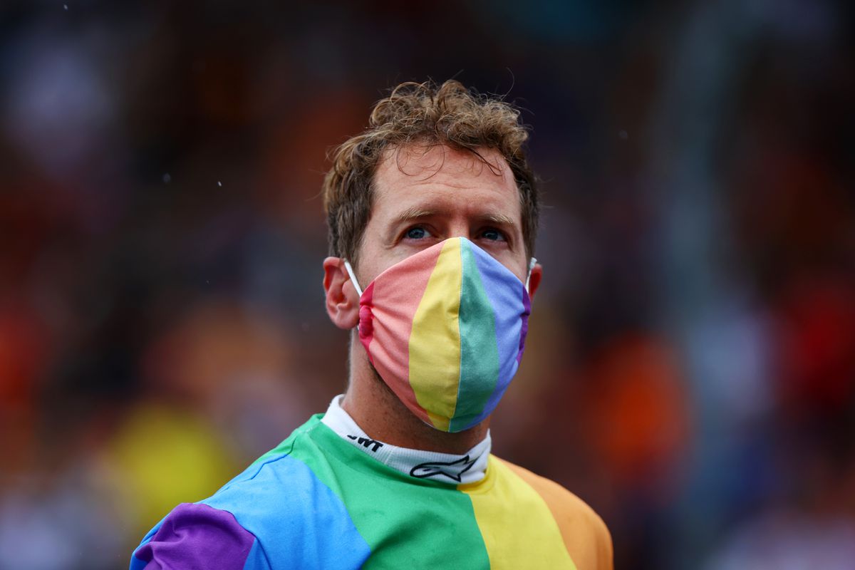 Sebastian Vettel wears a Pride-themed face mask and shirt prior to the start of August’s F1 Grand Prix of Hungary.