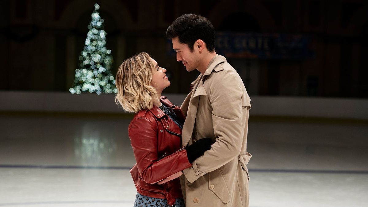 Kate (Clarke) and Tom (Golding) embrace in an ice rink.