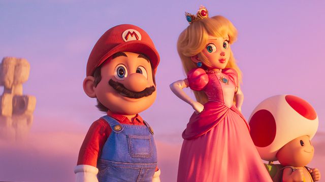 Mario, Peach, and Toad overlook a foggy valley full of sculptures in the Super Mario Bros. Movie