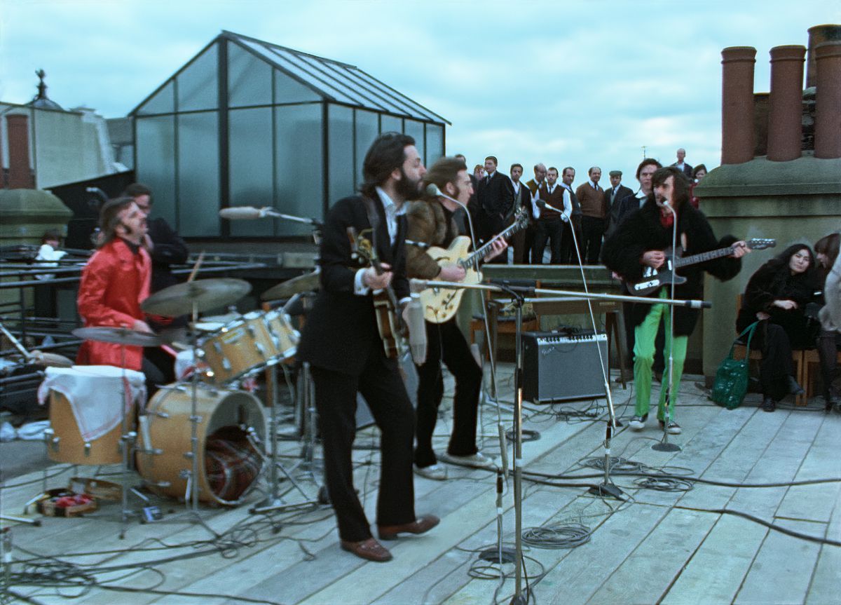 The Beatles at their 1969 rooftop concert from the docuseries The Beatles: Get Back