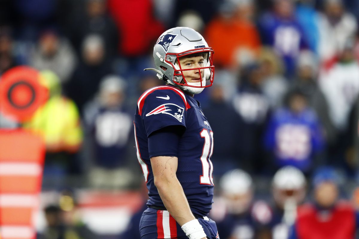 Quarterback Mac Jones #10 of the New England Patriots looks on during the fourth quarter of the game against the Buffalo Bills at Gillette Stadium on December 26, 2021 in Foxborough, Massachusetts.