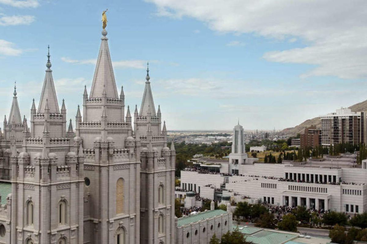 The Salt Lake Temple at left with the crowd leaving the Conference center after the General Conference Saturday afternoon Session. 