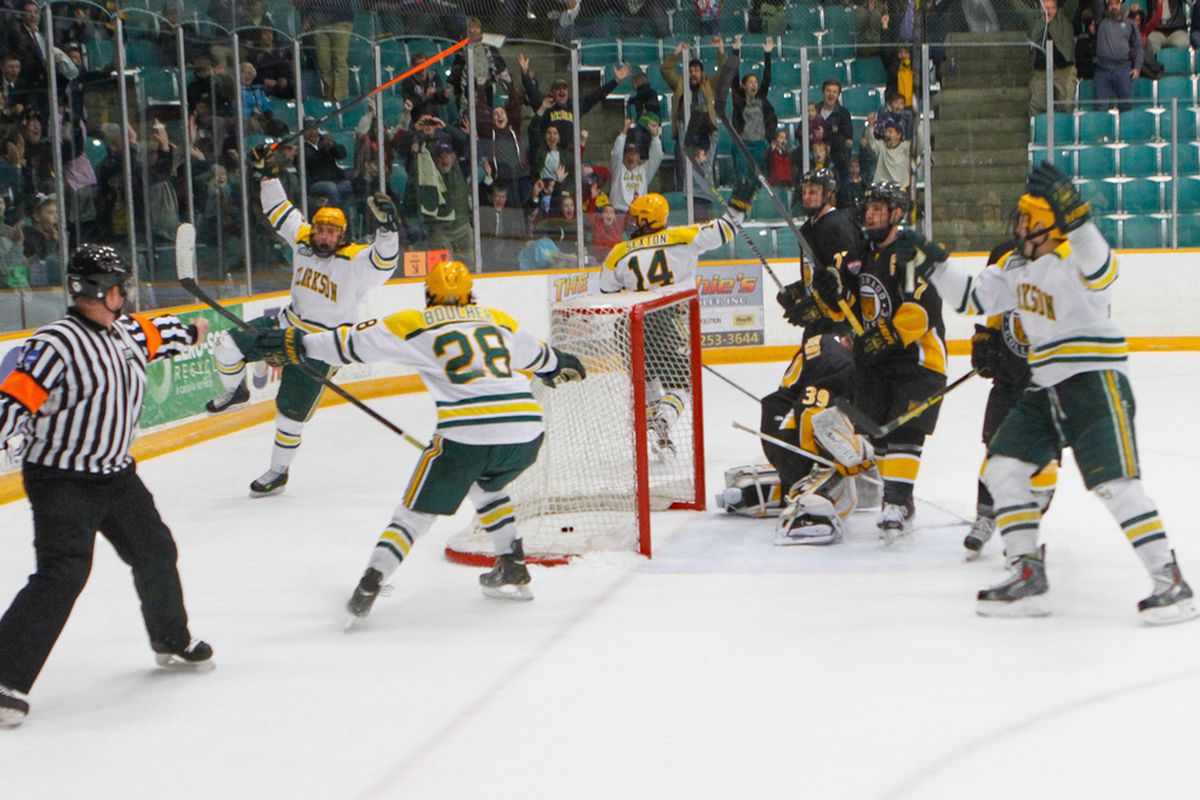 Clarkson players celebrate an overtime victory over Colorado College.