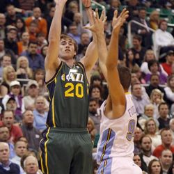 FILE -- In this Nov. 26, 2012 photo, Utah Jazz guard Gordon Hayward (20) shoots against the Denver Nuggets. The Jazz and Nuggets will play Wednesday in a game that will have huge playoff implications.